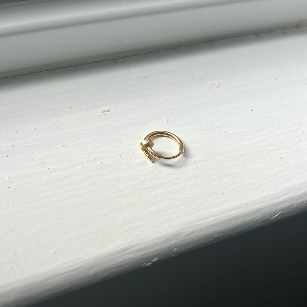 Cartier nail earring in yellow gold